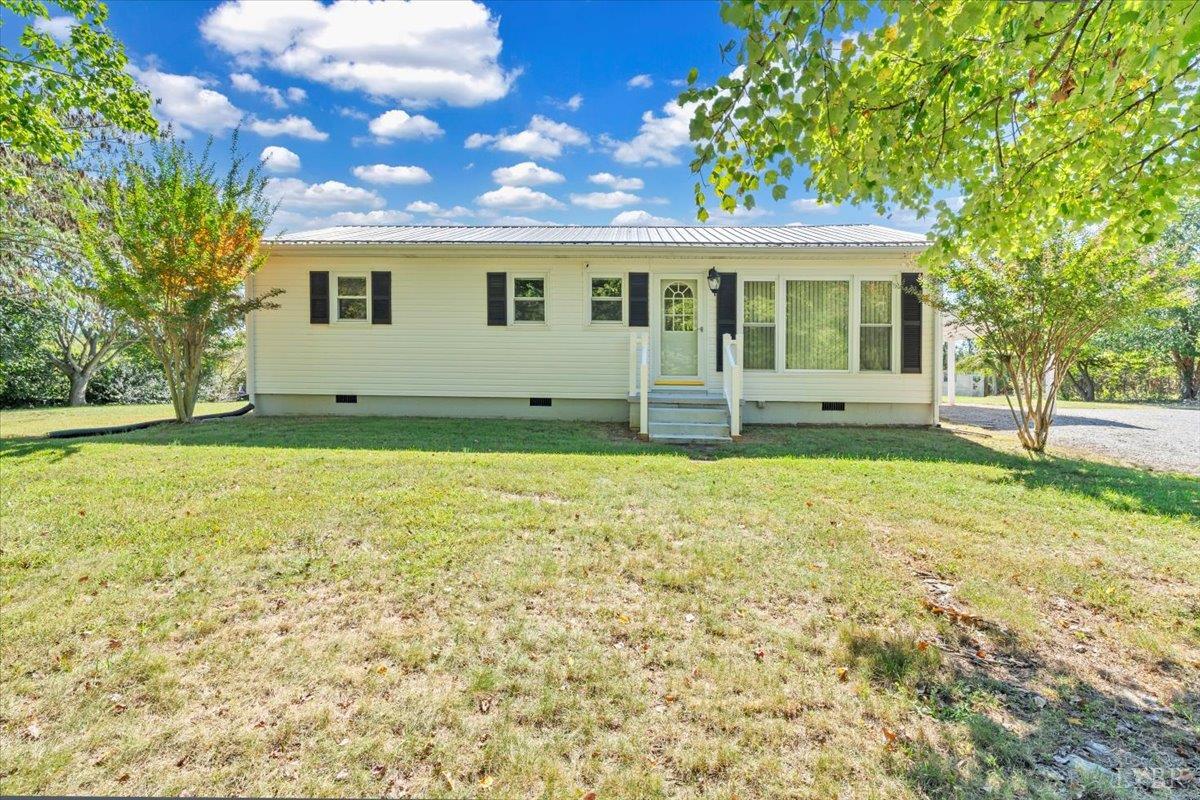 4152 Blue Ridge Drive Gretna, VA 24557 - Photo 44 of 74 a front view of a house with a yard