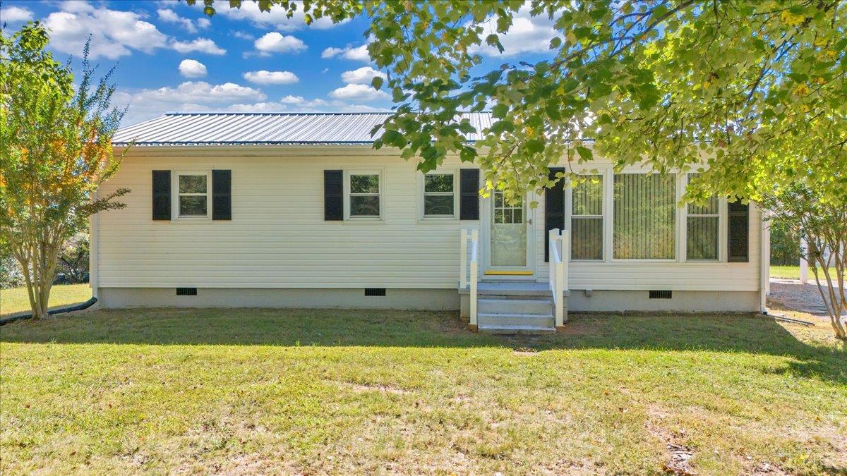 4152 Blue Ridge Drive Gretna, VA 24557 - Photo 52 of 74 a view of a house with a backyard