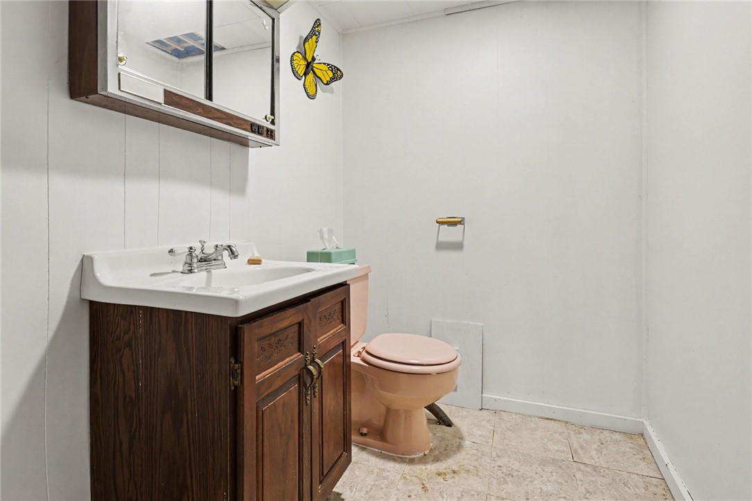64 Foster Road Greece, NY 14616 - Photo 22 of 35 Half bath in basement rec area