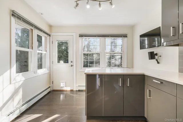 a kitchen with a window and a sink