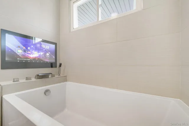 a bathroom with a bathtub