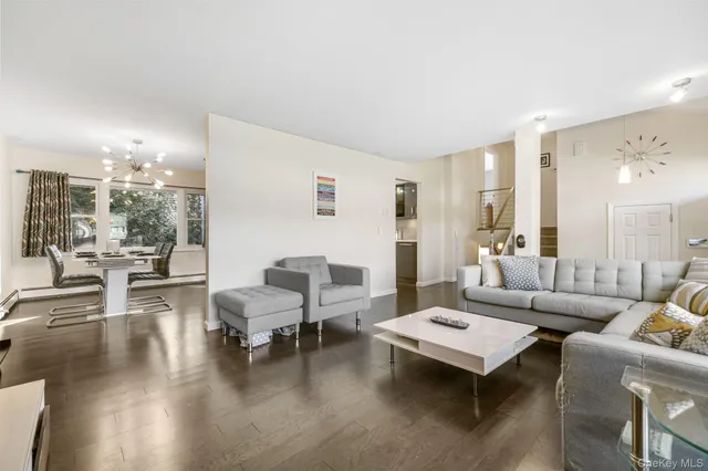 a living room with furniture and a table