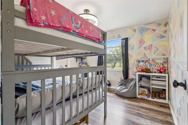 a view of a livingroom with furniture and workspace
