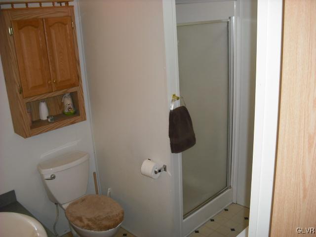 3261 Penn Dixie Road Nazareth, PA 18064 - Photo 17 of 30 a bathroom with a toilet and a shower