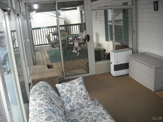 3261 Penn Dixie Road Nazareth, PA 18064 - Photo 21 of 30 a bedroom with a balcony a bed and a window
