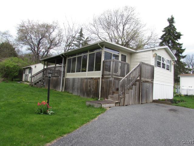 3261 Penn Dixie Road Nazareth, PA 18064 - Photo 3 of 30 a house that is sitting in the grass