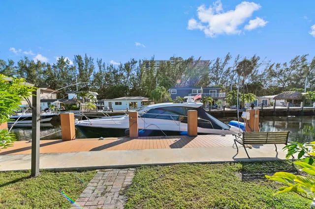 a view of a patio with swimming pool