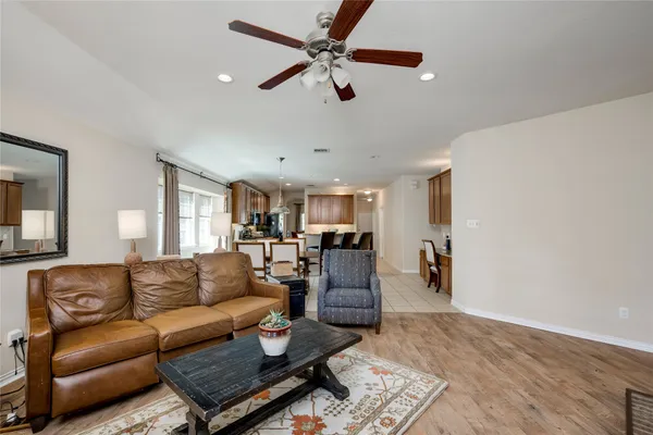 a living room with furniture or couch and a fireplace
