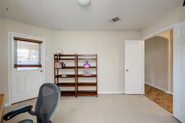 a white stove top oven sitting inside of a kitchen