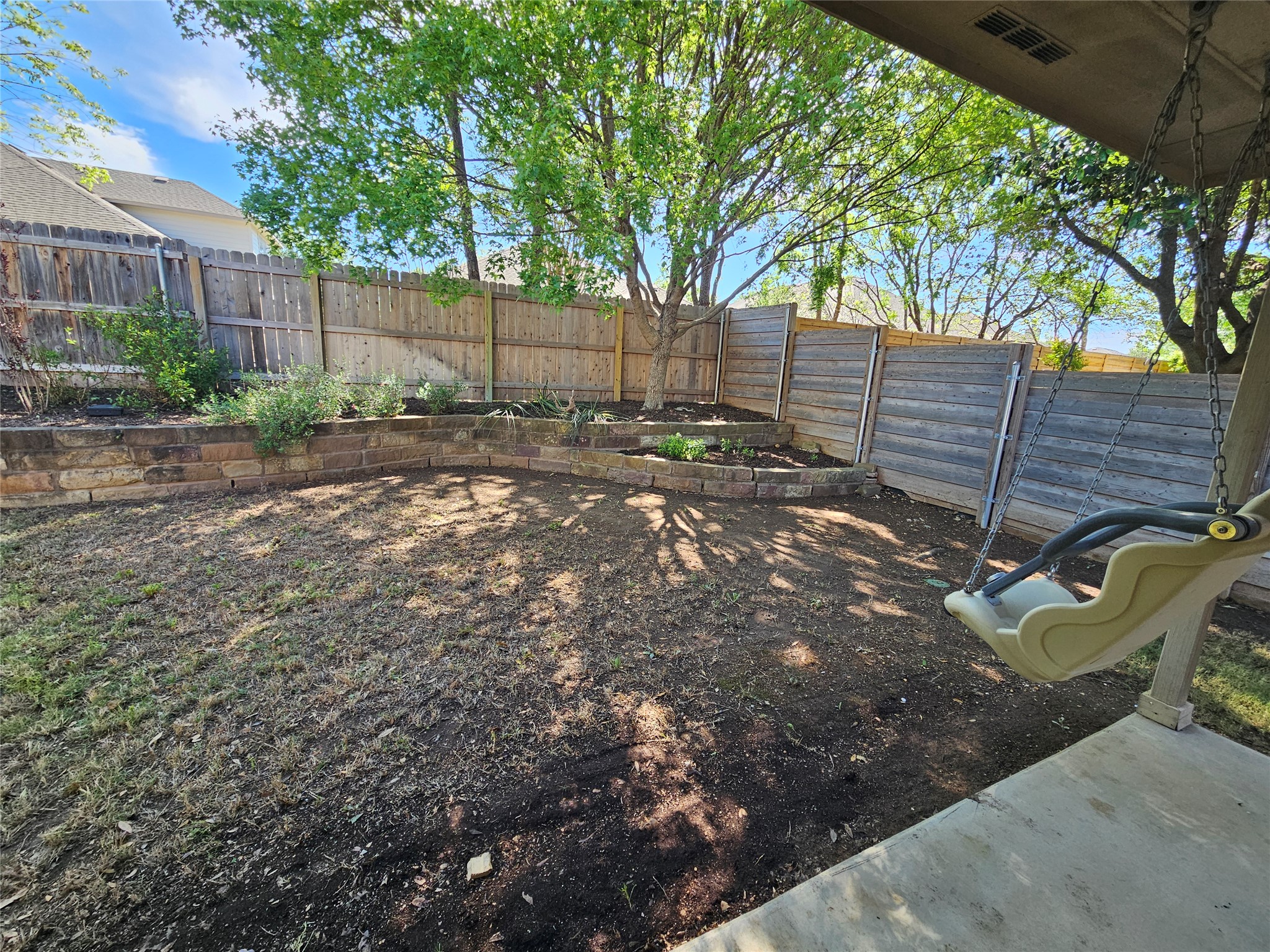 1323 Talley Loop Buda, TX 78610 - Photo 28 of 32 a view of a backyard with tree