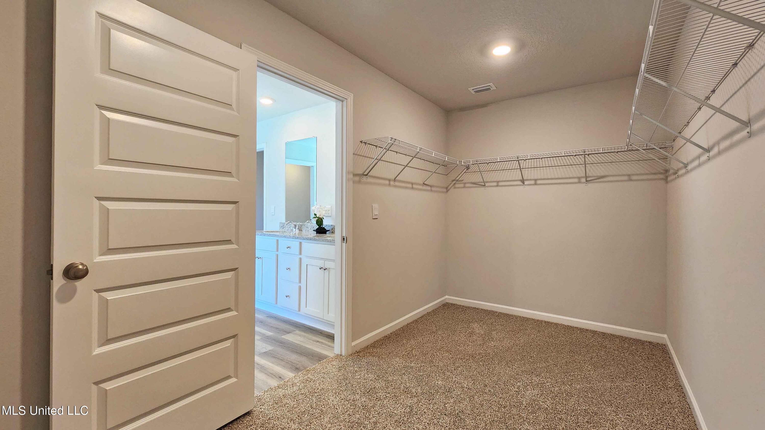 13509 Pond Ridge Way Gulfport, MS 39503 - Photo 25 of 35 Primary Closet