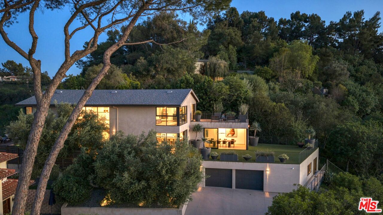 3337 Beverly Ranch Road Beverly Hills, CA 90210 - Photo 1 of 36 a view of a house with a backyard