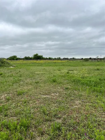 a view of an ocean and mountain