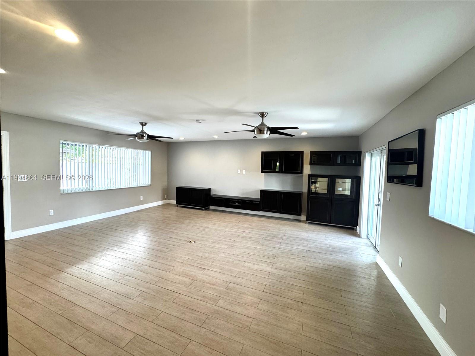 10760 Southwest 63rd Street Miami, FL 33173 - Photo 13 of 61 a view of kitchen with furniture and wooden floor