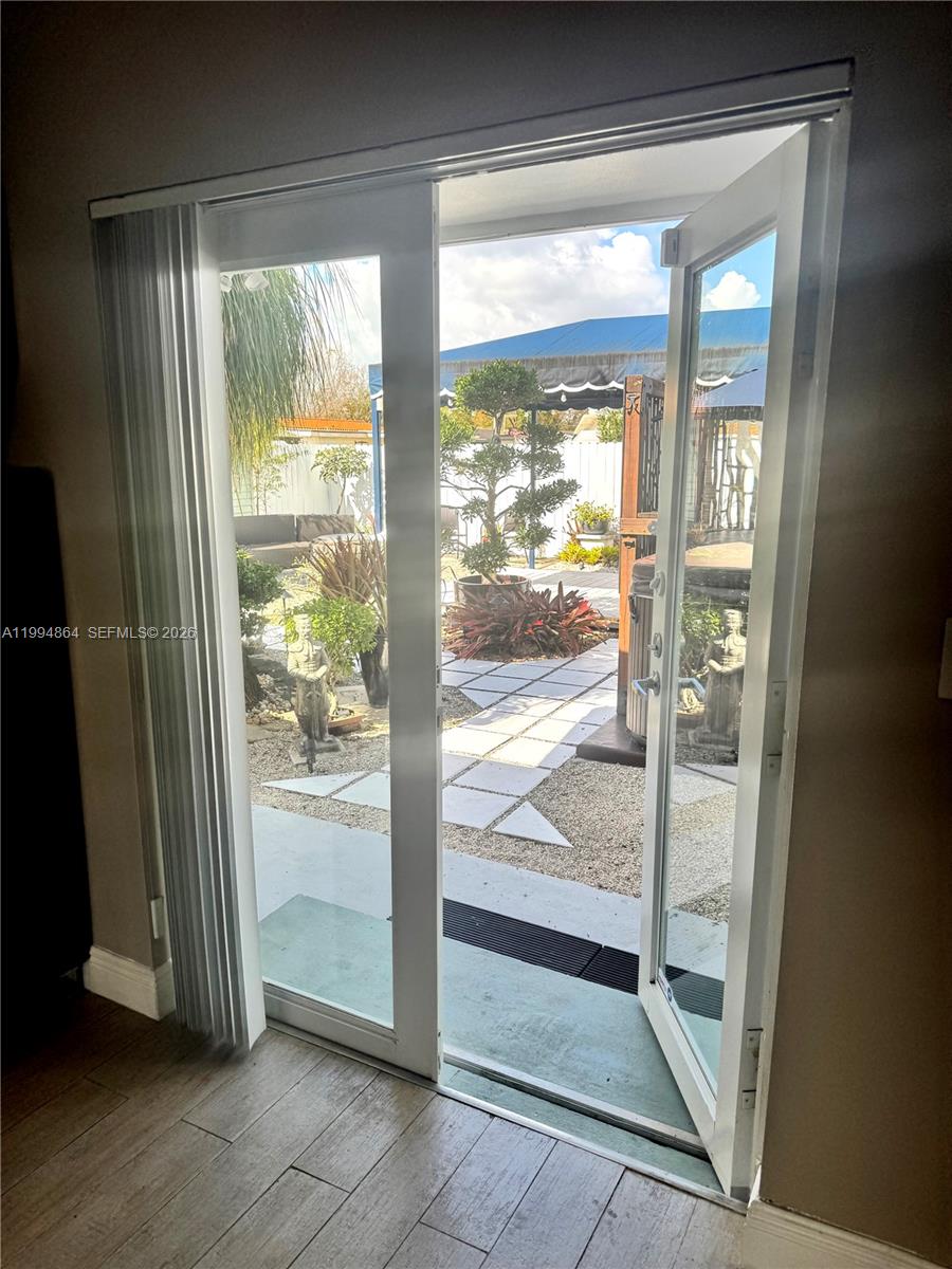 10760 Southwest 63rd Street Miami, FL 33173 - Photo 14 of 61 a view of an front door