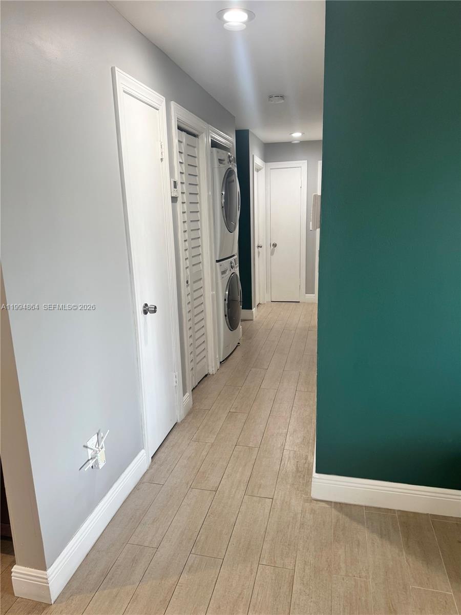 10760 Southwest 63rd Street Miami, FL 33173 - Photo 19 of 61 wooden floor with a window