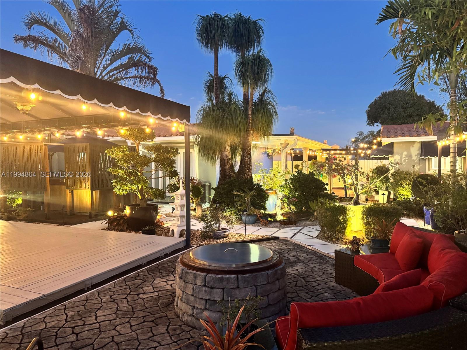 10760 Southwest 63rd Street Miami, FL 33173 - Photo 42 of 61 Sitting area with fire pit