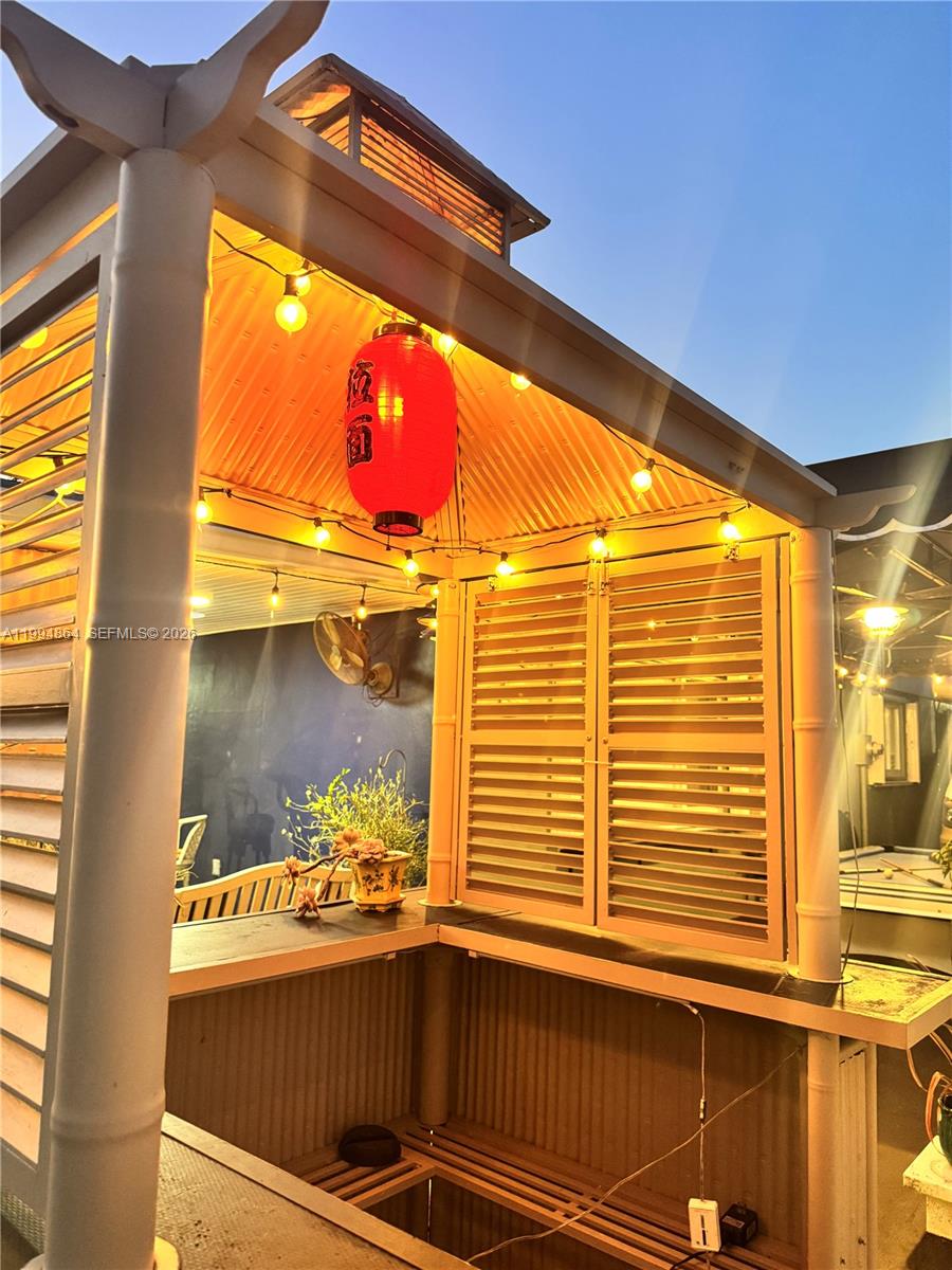 10760 Southwest 63rd Street Miami, FL 33173 - Photo 57 of 61 a view of a balcony and a yard