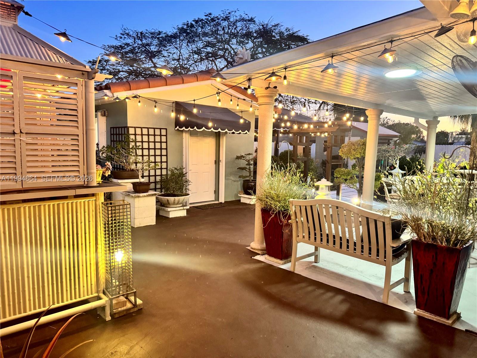 10760 Southwest 63rd Street Miami, FL 33173 - Photo 59 of 61 a view of a porch with a furniture
