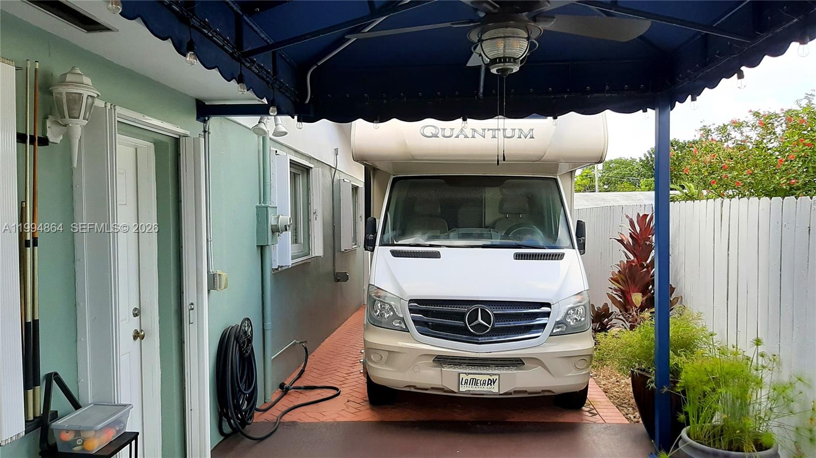 10760 Southwest 63rd Street Miami, FL 33173 - Photo 60 of 61 Driveway / carport w/ RV/EV hookup
