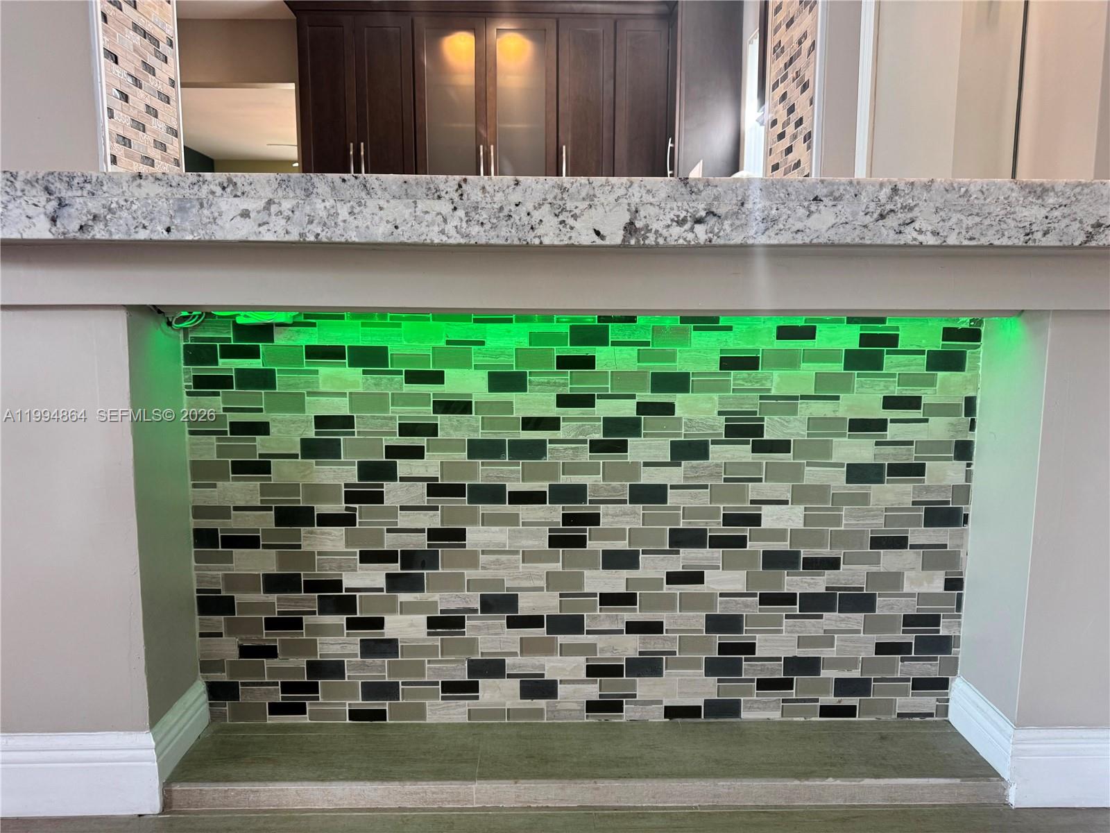 10760 Southwest 63rd Street Miami, FL 33173 - Photo 10 of 61 a bathroom with a mirror and a bathtub