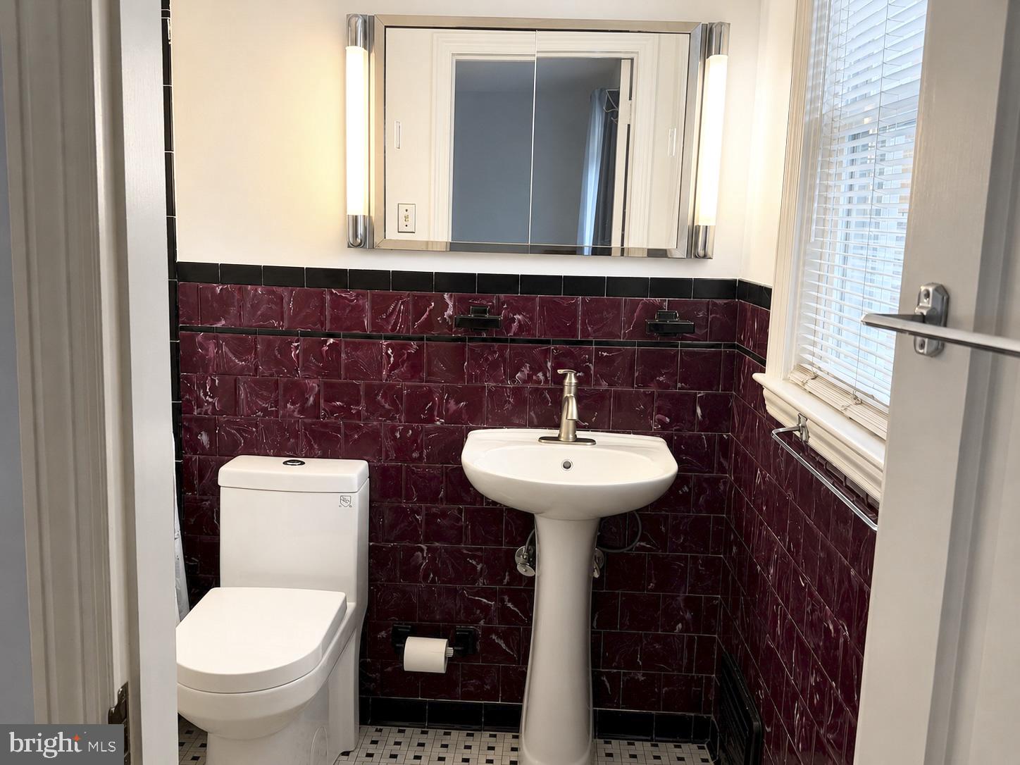 1615 Burnwood Road Baltimore, MD 21239 - Photo 16 of 83 Charming bathroom with vintage flair.