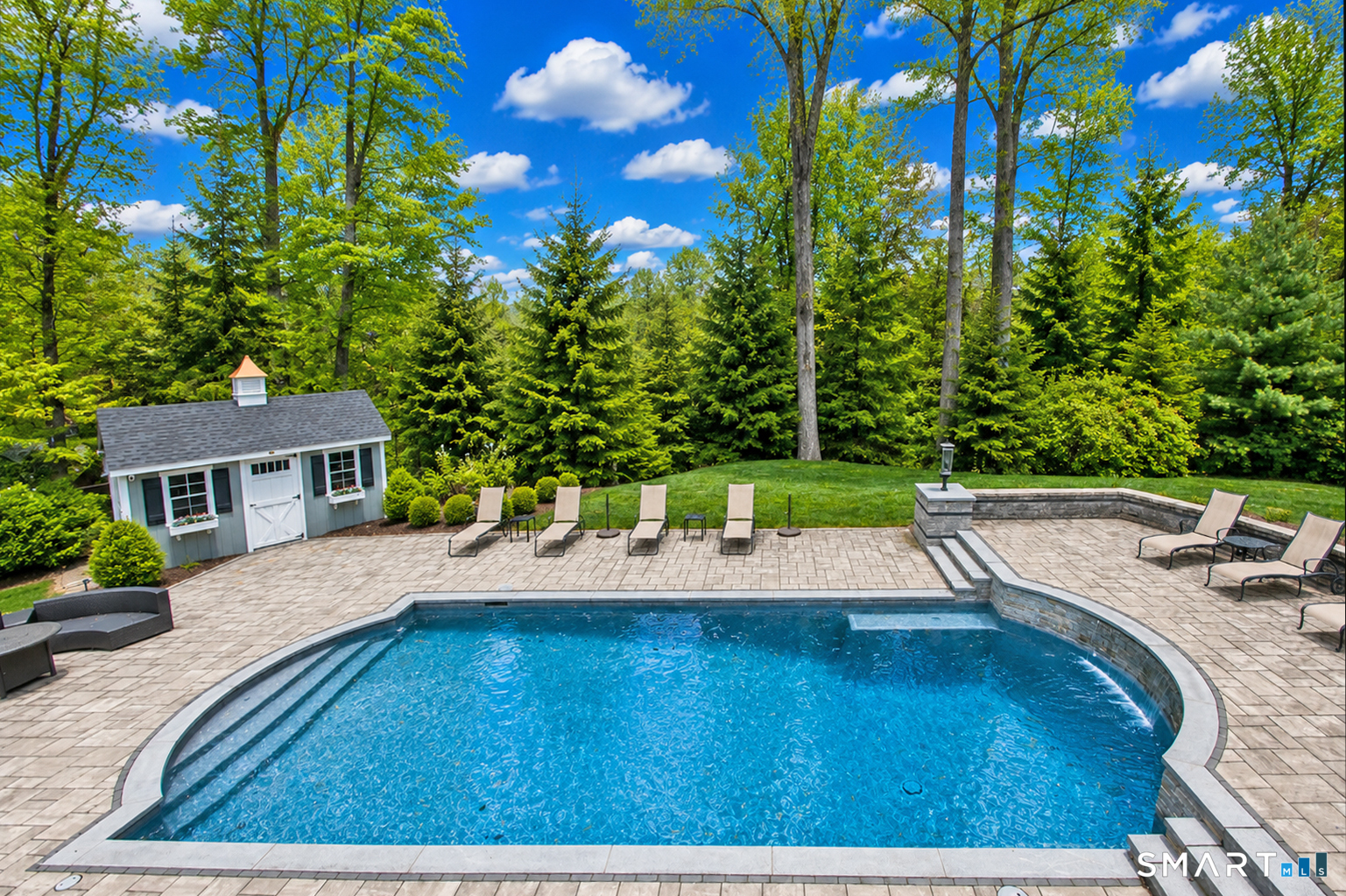 28 Quail Ridge Drive Avon, CT 06001 - Photo 11 of 40 a view of yard with swimming pool