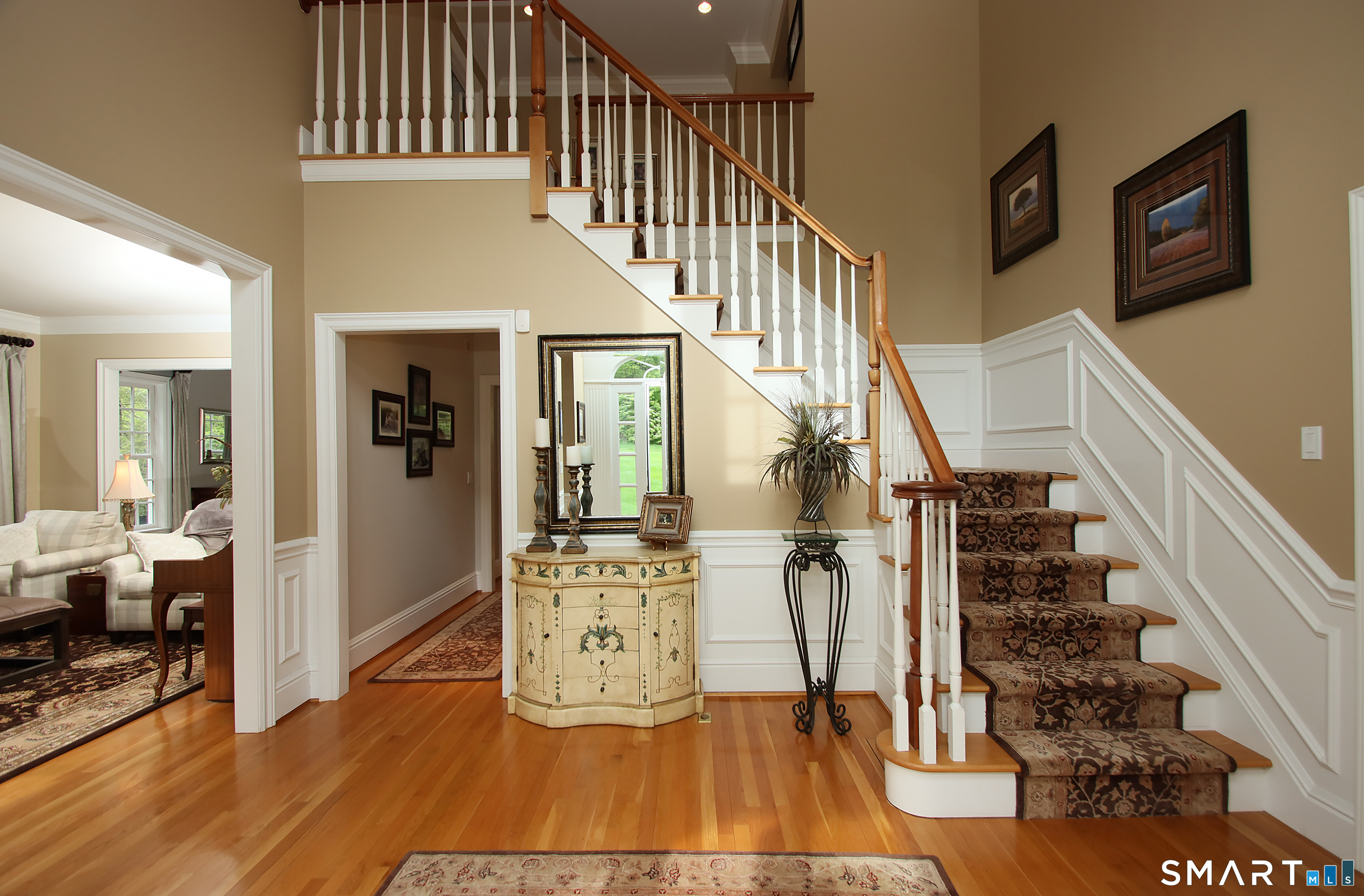 28 Quail Ridge Drive Avon, CT 06001 - Photo 14 of 40 a view of entryway and hall with wooden floor