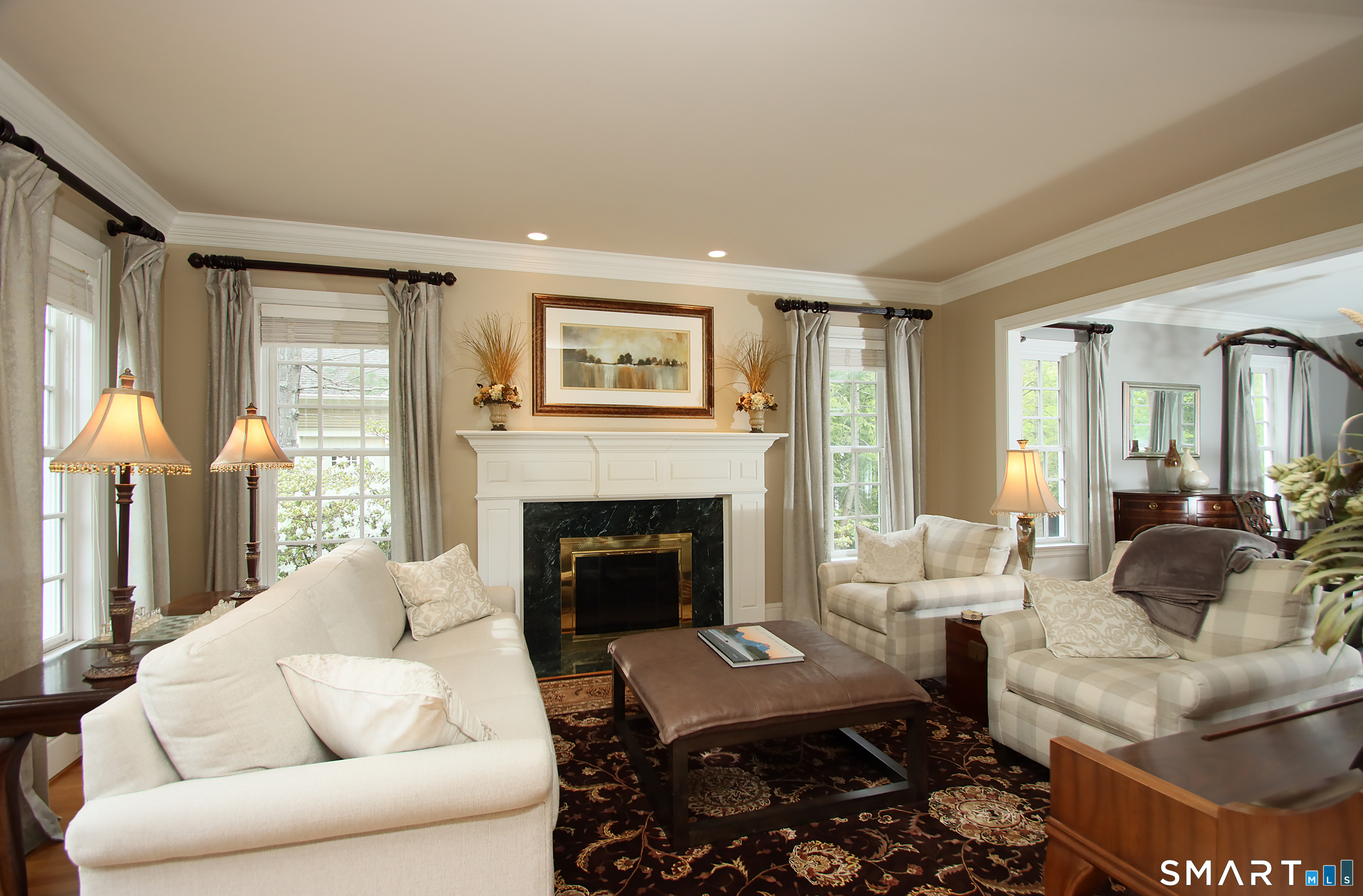 28 Quail Ridge Drive Avon, CT 06001 - Photo 16 of 40 a living room with furniture fireplace and a large window