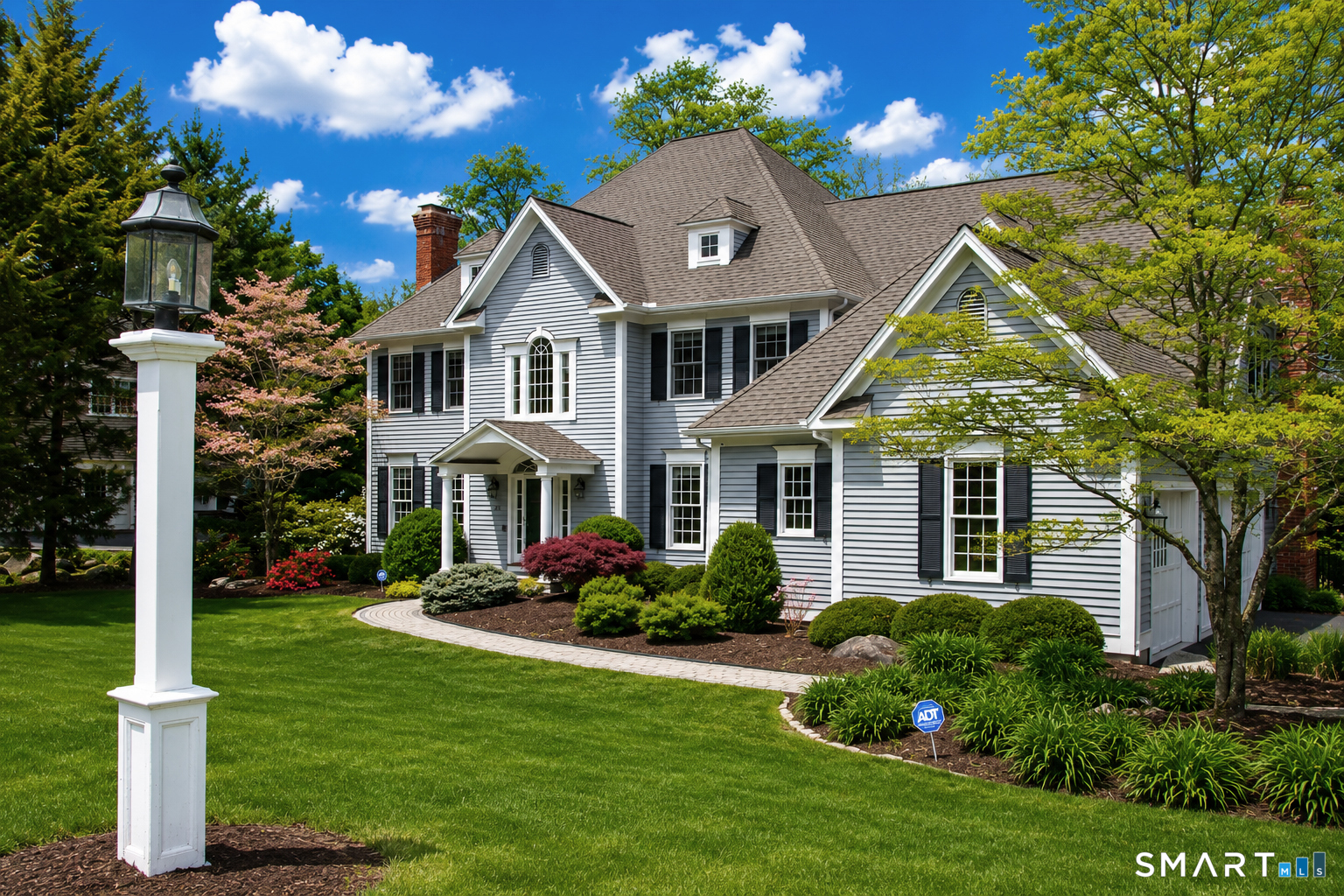 28 Quail Ridge Drive Avon, CT 06001 - Photo 2 of 40 a front view of a house with a yard