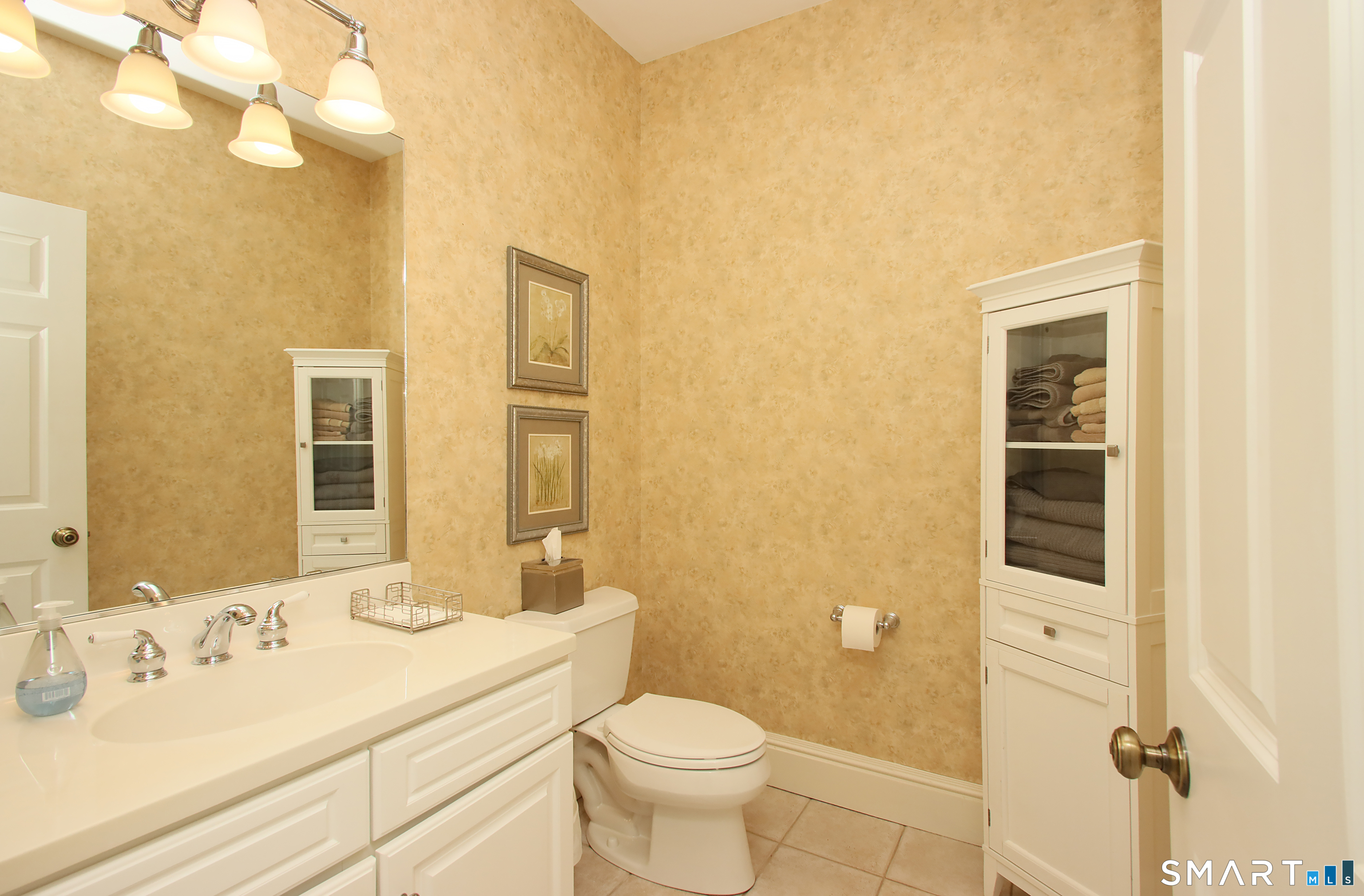28 Quail Ridge Drive Avon, CT 06001 - Photo 27 of 40 a bathroom with a sink a toilet and shower