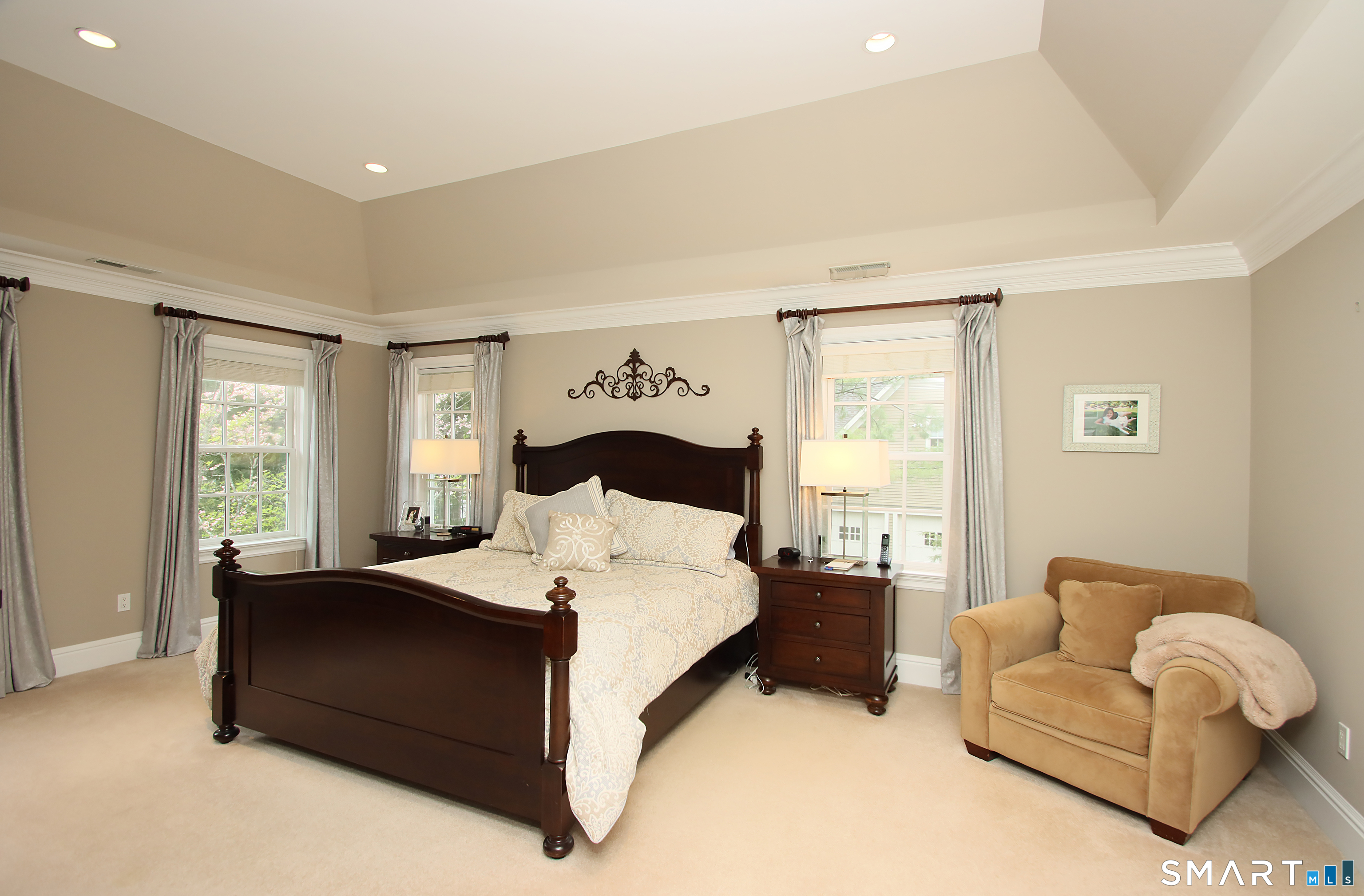 28 Quail Ridge Drive Avon, CT 06001 - Photo 30 of 40 a bedroom with a bed couch and window