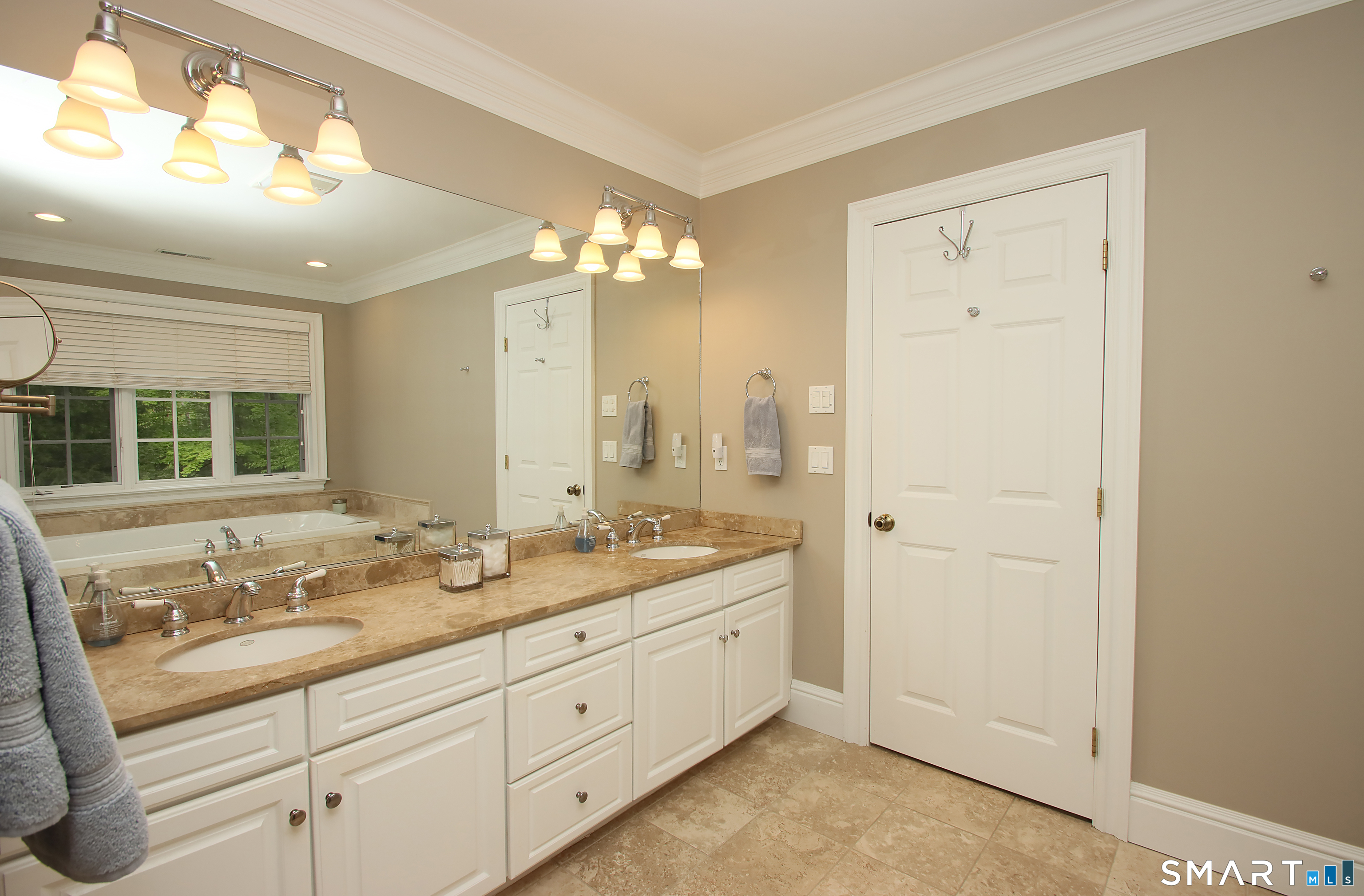 28 Quail Ridge Drive Avon, CT 06001 - Photo 33 of 40 a bathroom with a granite countertop double vanity sink mirror and
