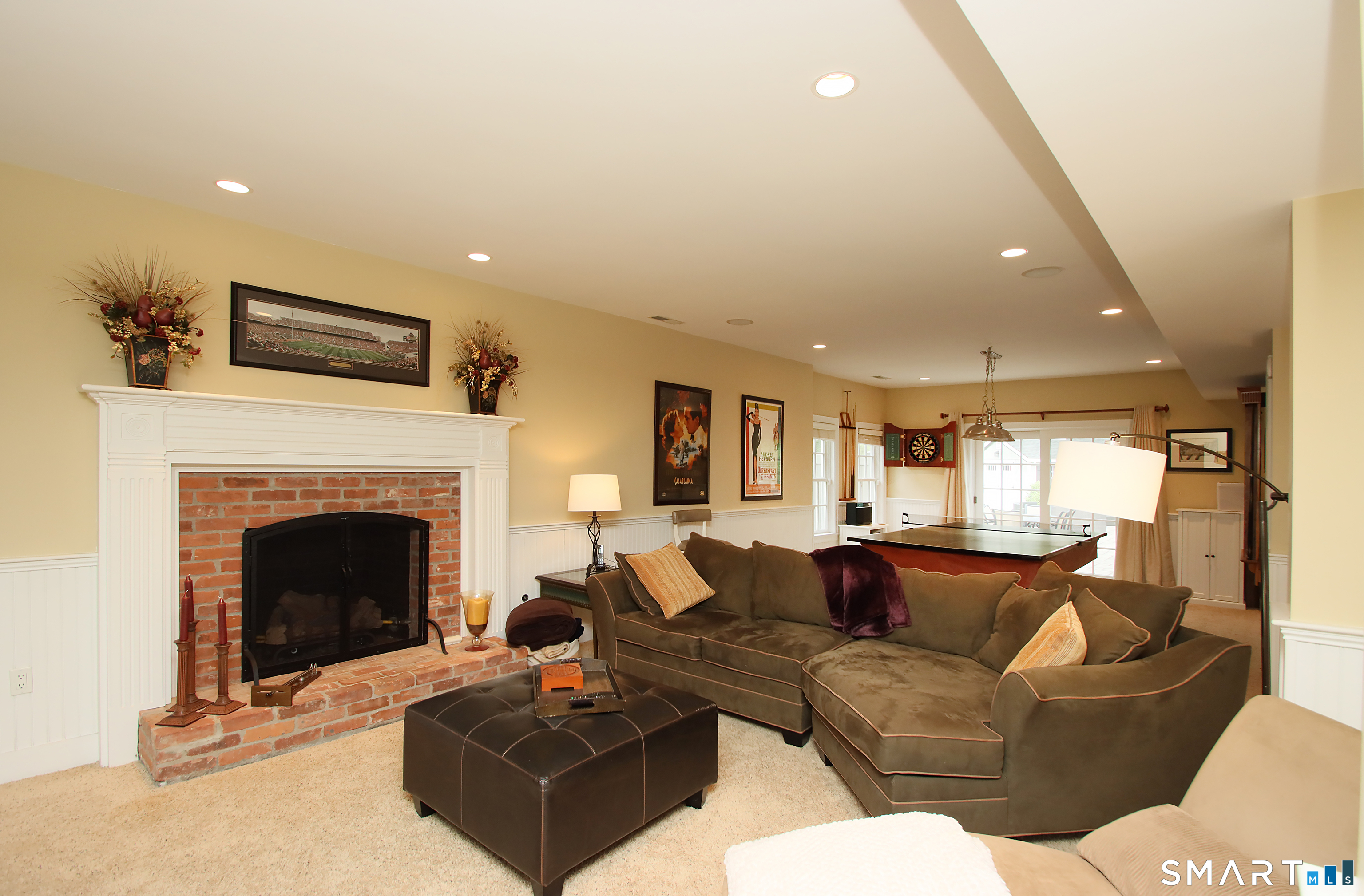 28 Quail Ridge Drive Avon, CT 06001 - Photo 38 of 40 a living room with furniture and a fireplace