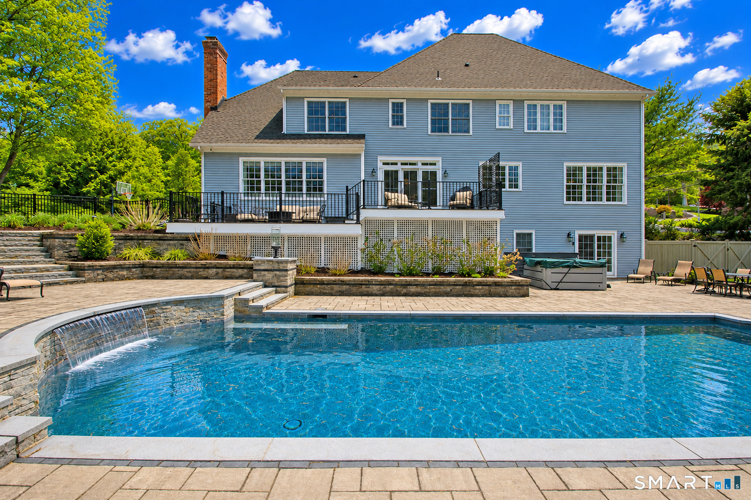 28 Quail Ridge Drive Avon, CT 06001 - Photo 5 of 40 a view of a house with a swimming pool