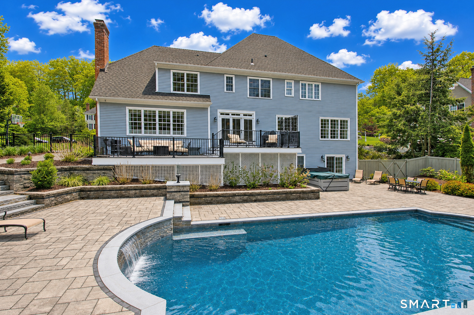28 Quail Ridge Drive Avon, CT 06001 - Photo 6 of 40 a swimming pool view with a seating space