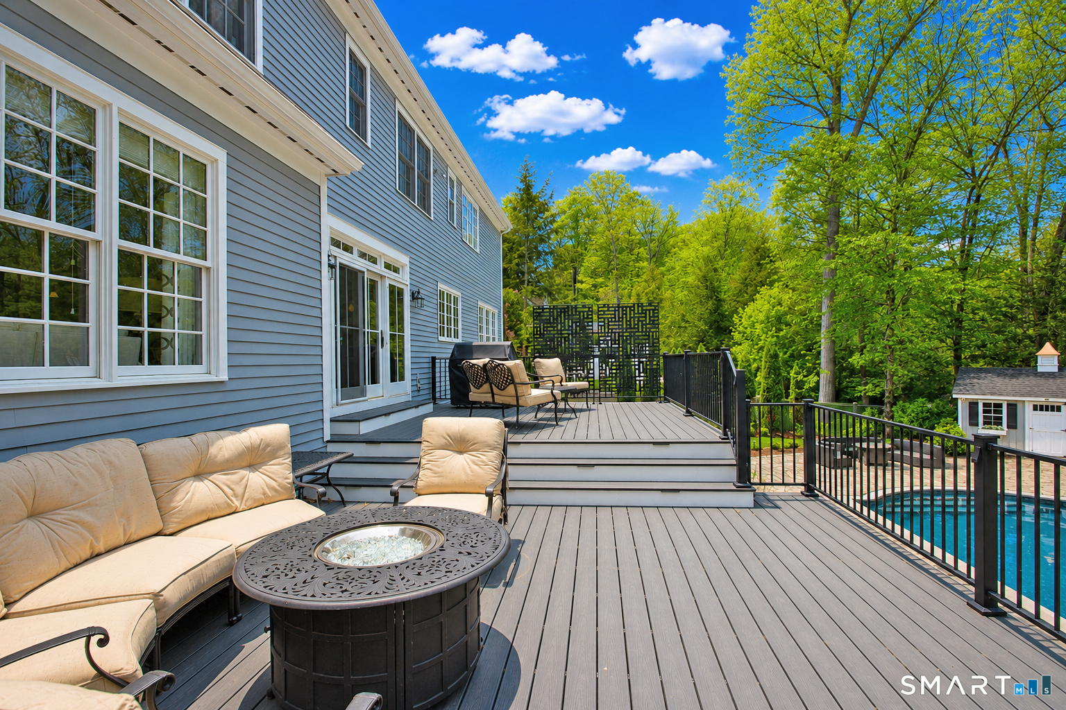 28 Quail Ridge Drive Avon, CT 06001 - Photo 7 of 40 a view of a patio with couches table and chairs and potted plants