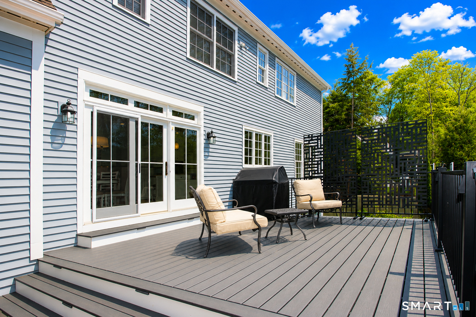 28 Quail Ridge Drive Avon, CT 06001 - Photo 8 of 40 a house view with a seating space and deck