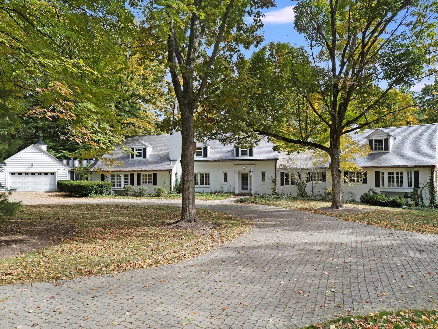1850 North Mulford Road Rockford, IL 61107 - Photo 1 of 42 a front view of residential houses with yard and trees