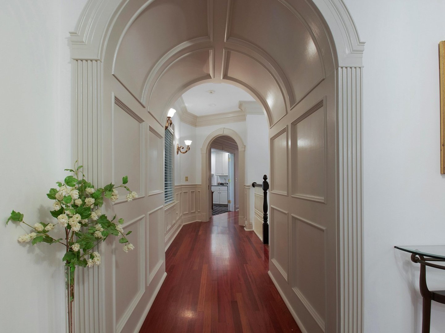 1850 North Mulford Road Rockford, IL 61107 - Photo 12 of 43 a hallway with a potted plant on a wall