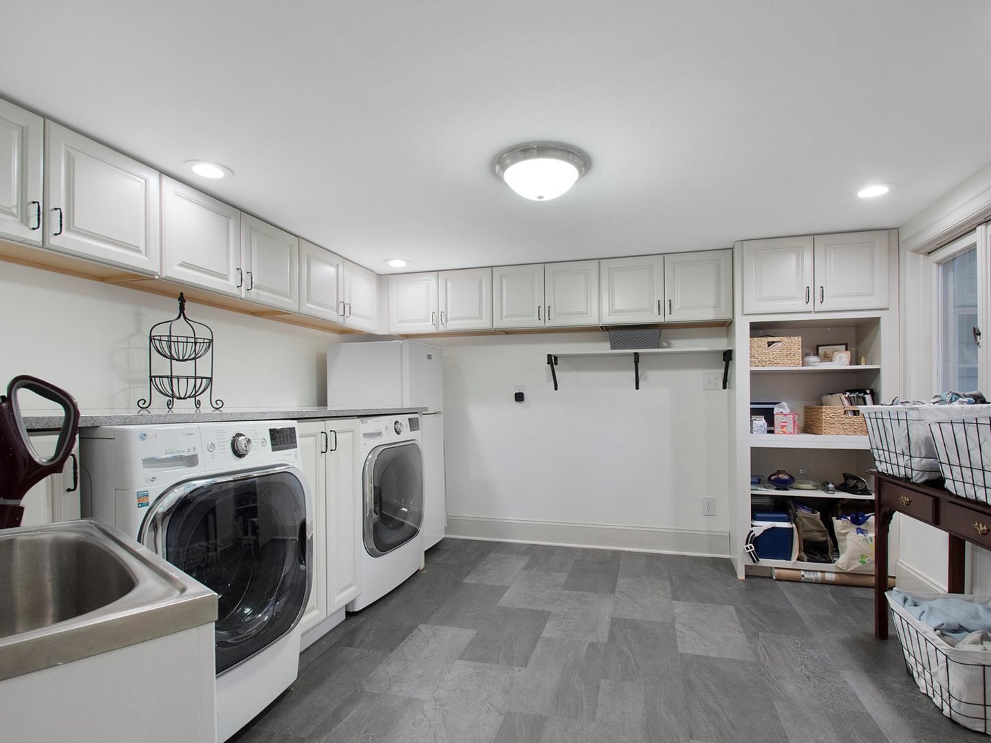 1850 North Mulford Road Rockford, IL 61107 - Photo 16 of 42 a view of a kitchen with fridge and wooden floor