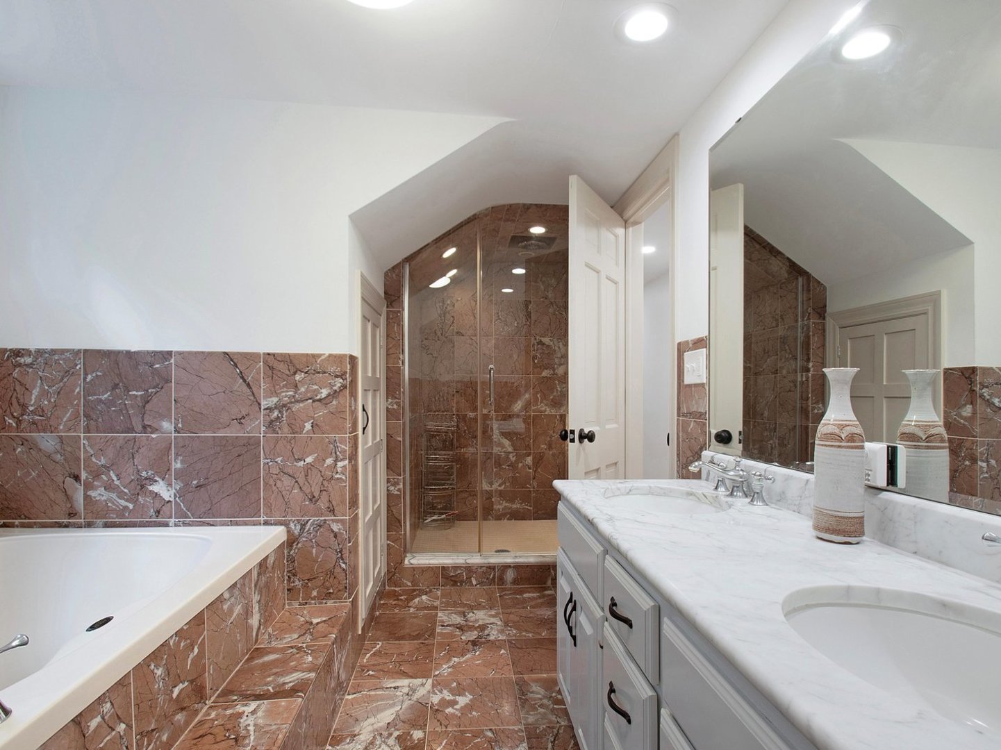 1850 North Mulford Road Rockford, IL 61107 - Photo 18 of 42 a bathroom with a sink and a bathtub