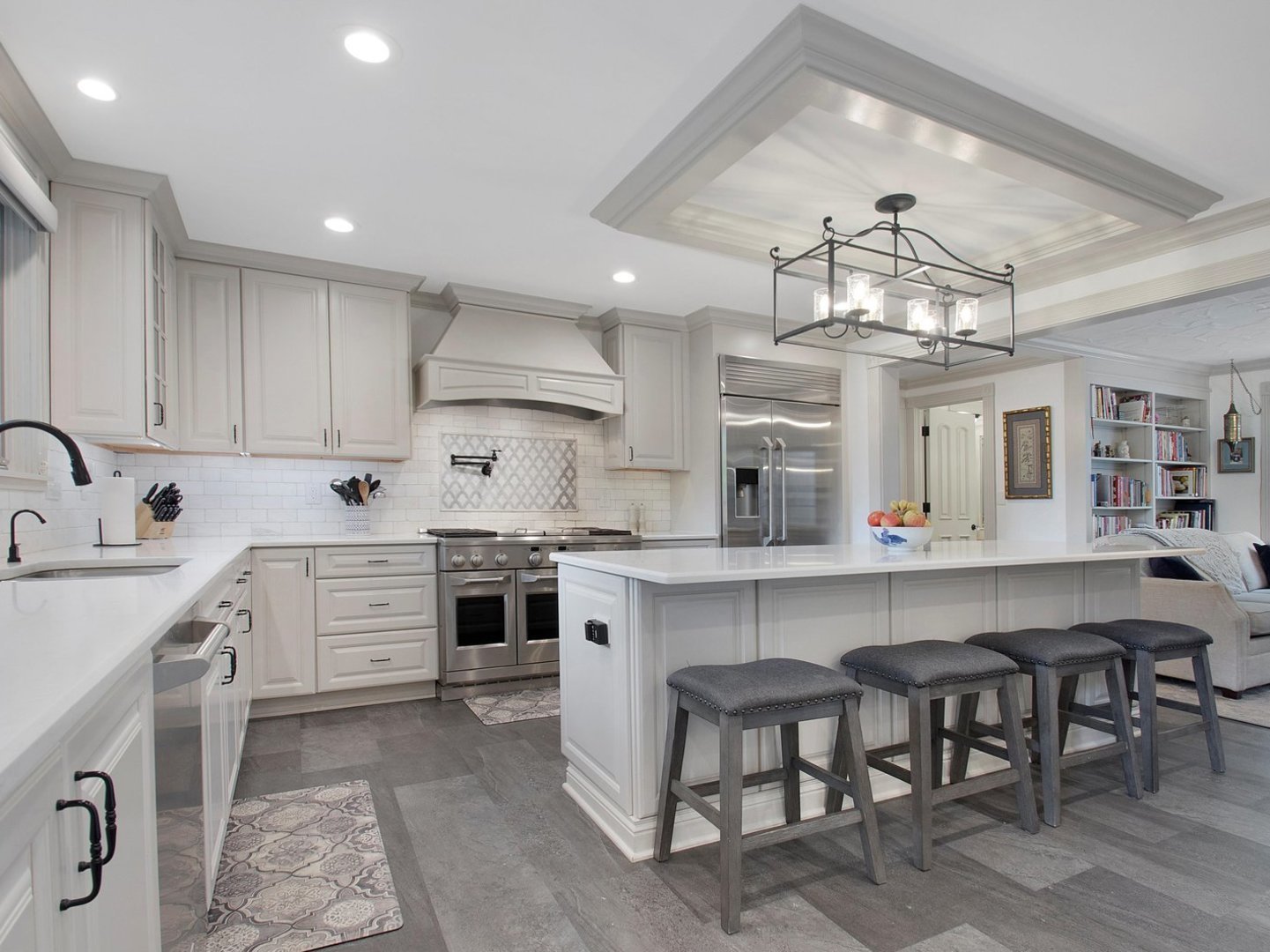 1850 North Mulford Road Rockford, IL 61107 - Photo 2 of 42 a kitchen with kitchen island granite countertop a sink a counter space cabinets and stainless steel appliances