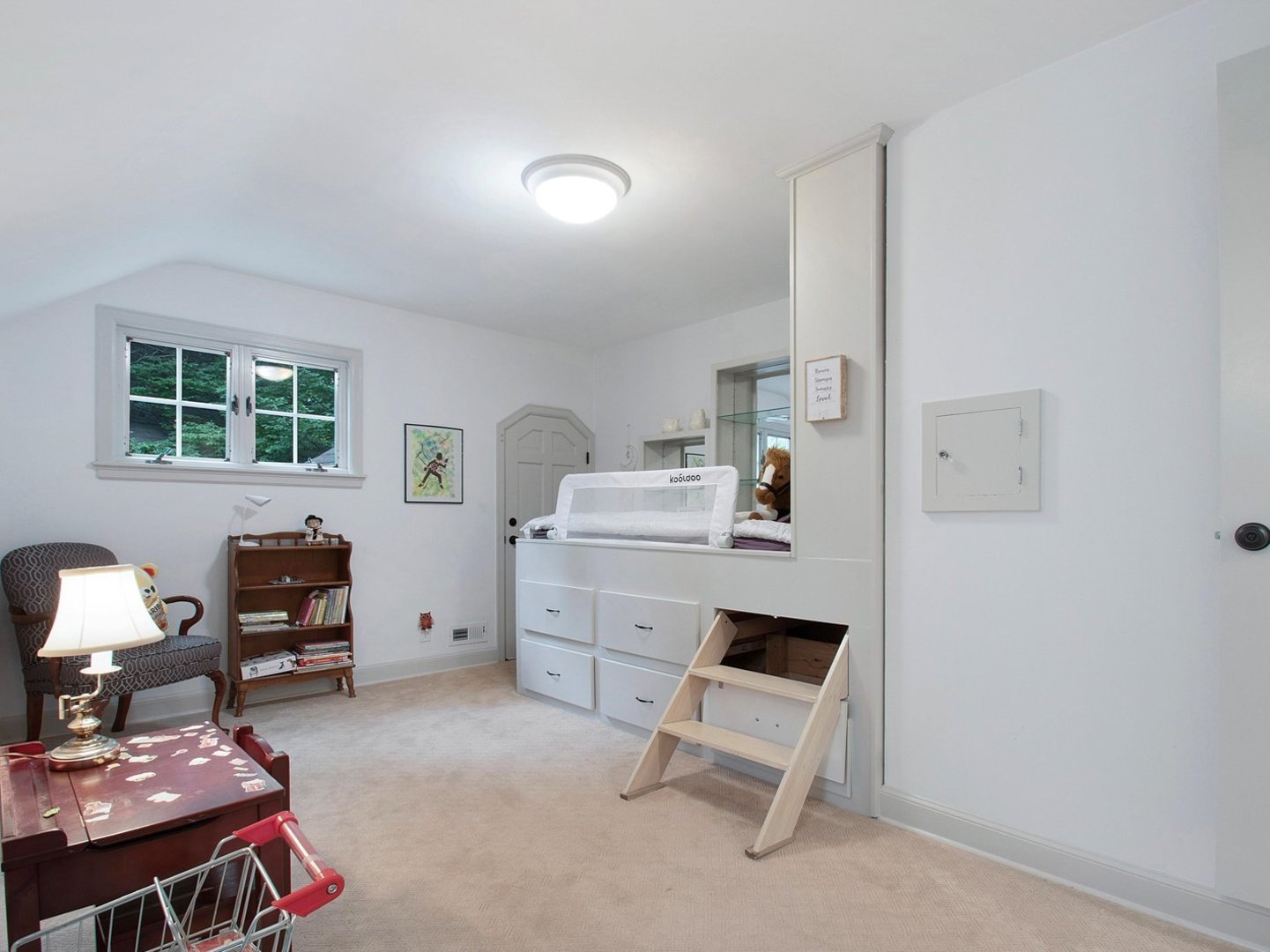 1850 North Mulford Road Rockford, IL 61107 - Photo 30 of 42 a room with furniture a air conditioner vent and a window