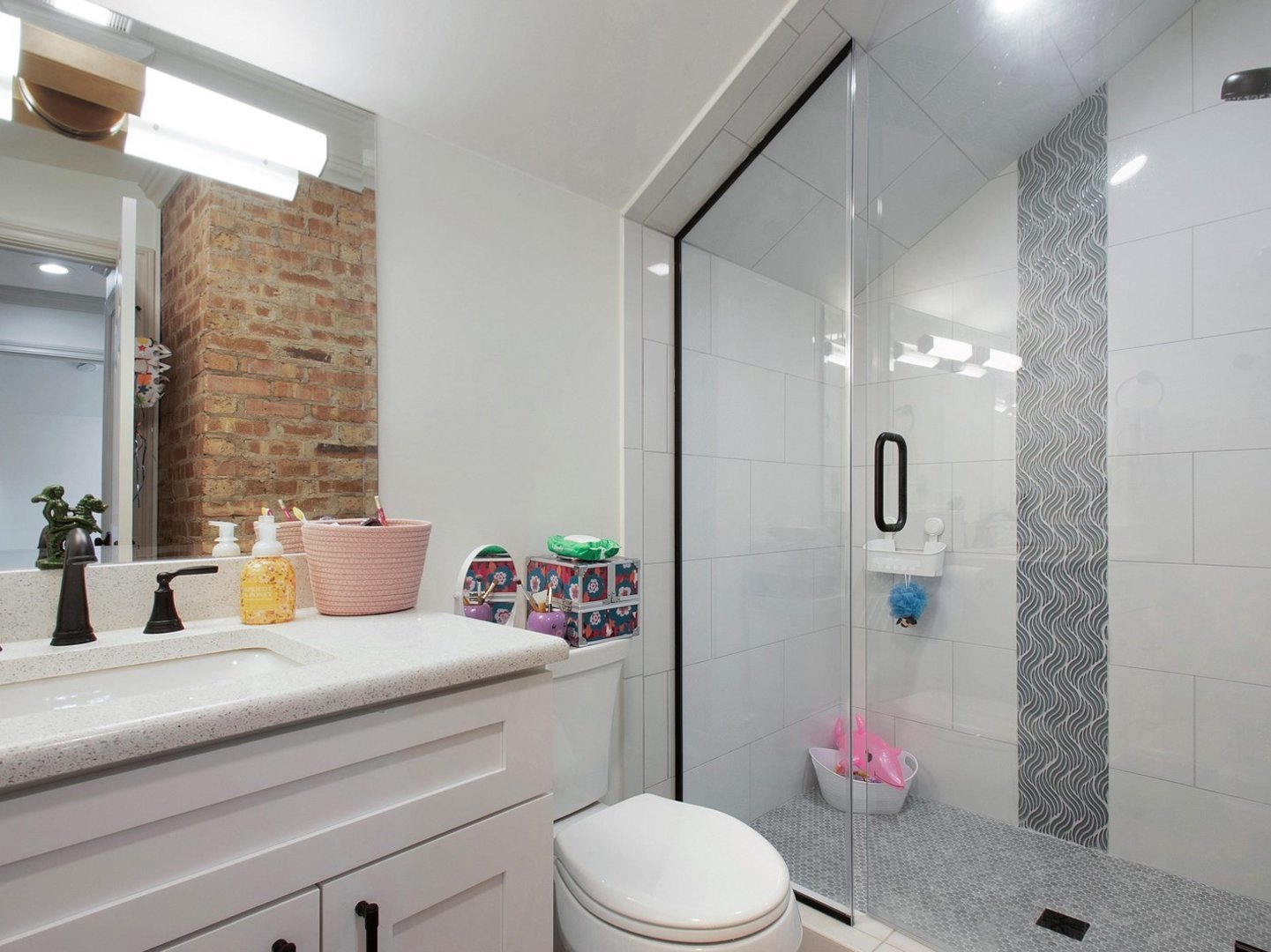 1850 North Mulford Road Rockford, IL 61107 - Photo 31 of 42 a bathroom with a sink and a mirror