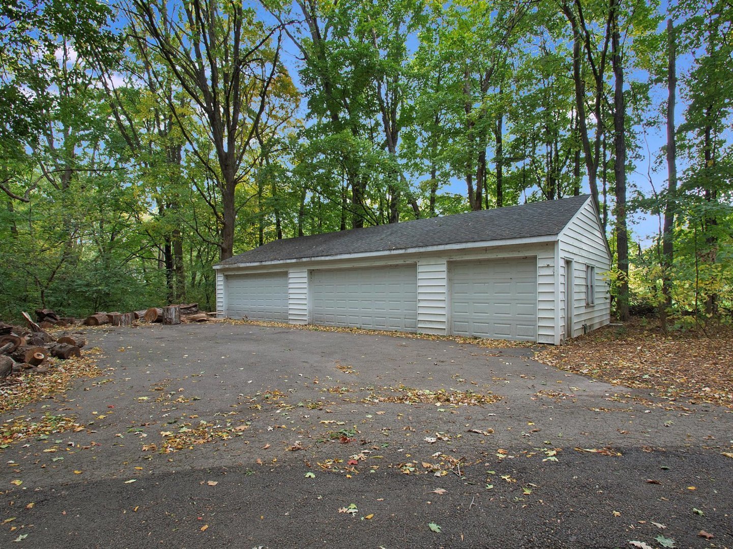 1850 North Mulford Road Rockford, IL 61107 - Photo 33 of 42 a small yard with a large tree