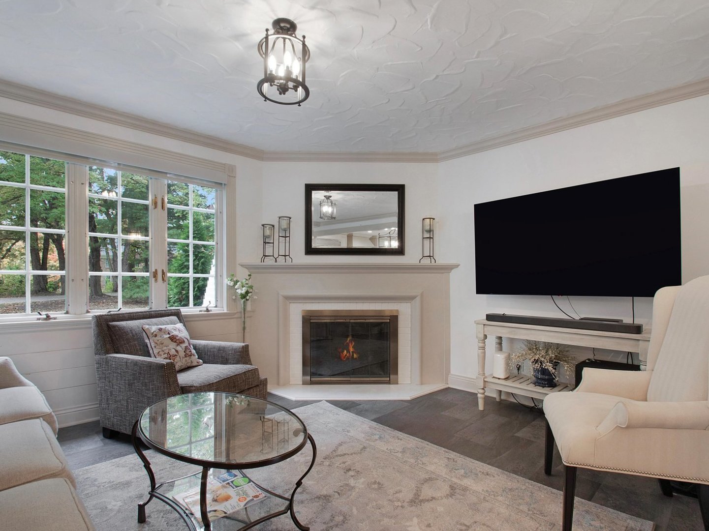 1850 North Mulford Road Rockford, IL 61107 - Photo 8 of 42 a living room with furniture and a flat screen tv
