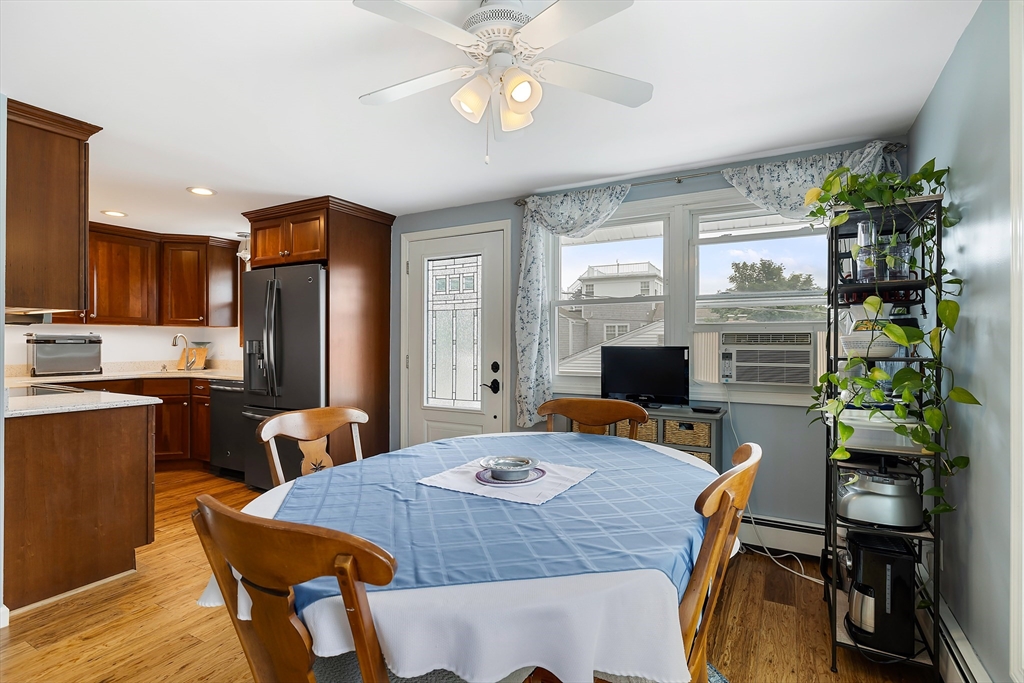 100 Madeline Road Falmouth, MA 02536 - Photo 15 of 29 a view of a dining room with furniture