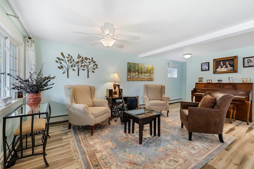100 Madeline Road Falmouth, MA 02536 - Photo 23 of 29 a living room with furniture and a potted plant