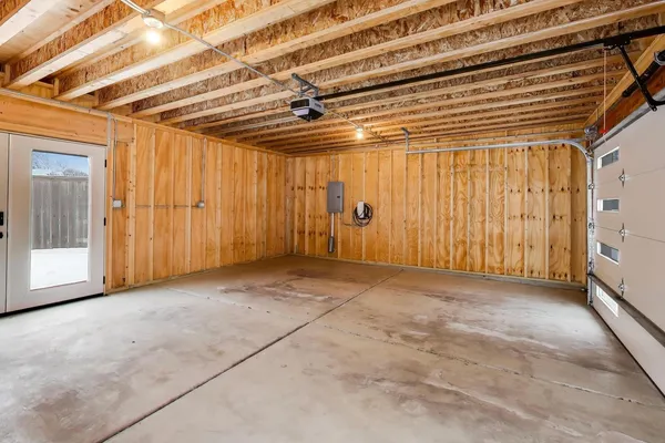 a view of a bathroom with a sink and a mirror
